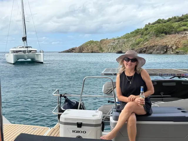 Scenic ocean view with woman on boat